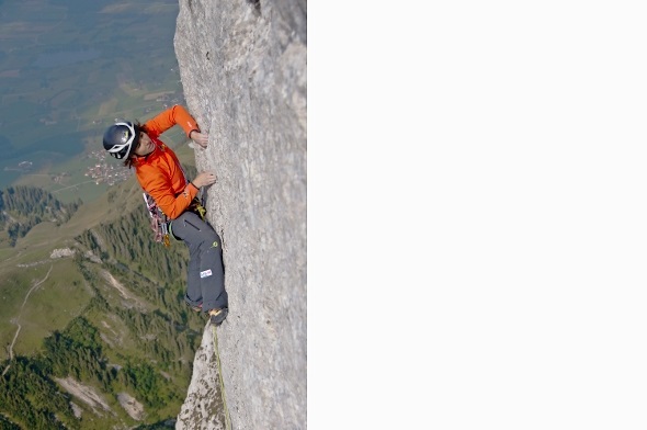 Barbara Büschlen in der Stockhorn-Nordwand. Im Hintergrund ist das Gürbetal und der Uebeschisee zu sehen.