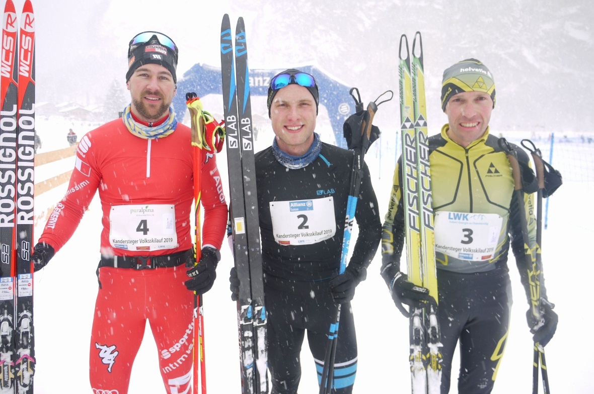 Der zweitklassierte Reto Hammer (links) mit Sieger Evgeny Klyukvin und Bruno Joller auf dem dritten Rang.