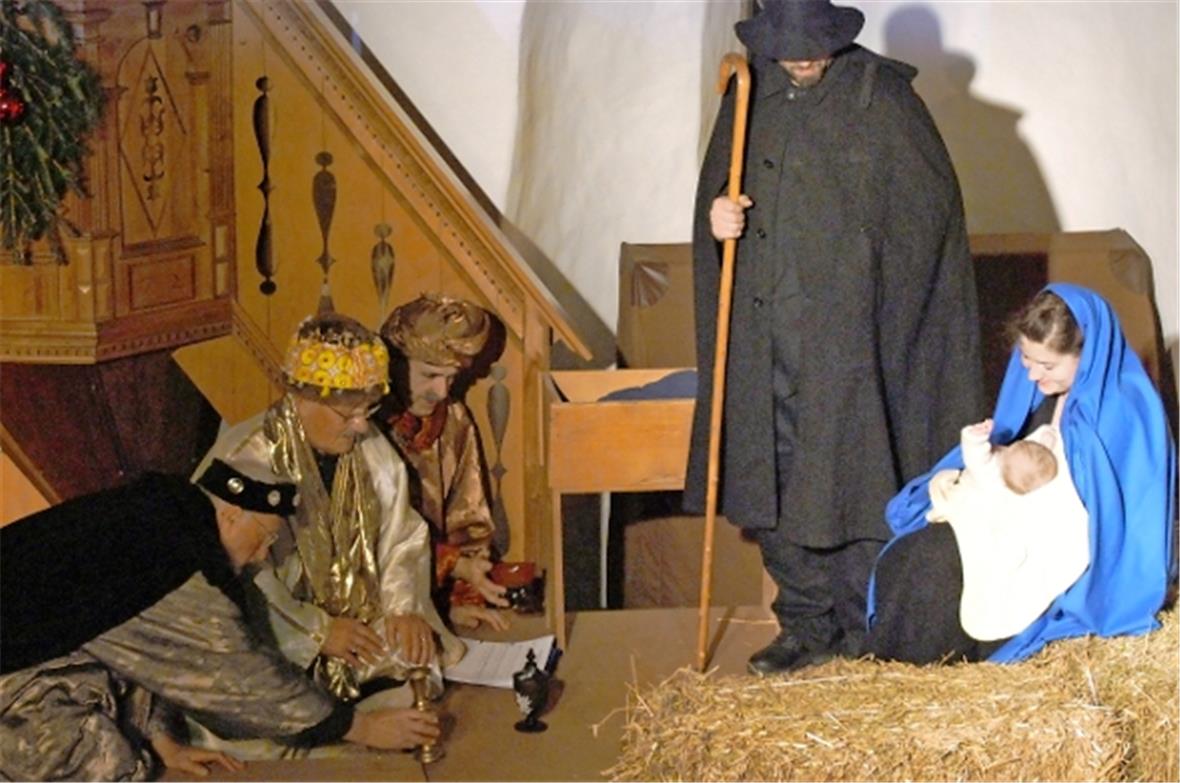 Die drei Waisen (Könige) bei Maria und Josef und Jesuskind im Stall.