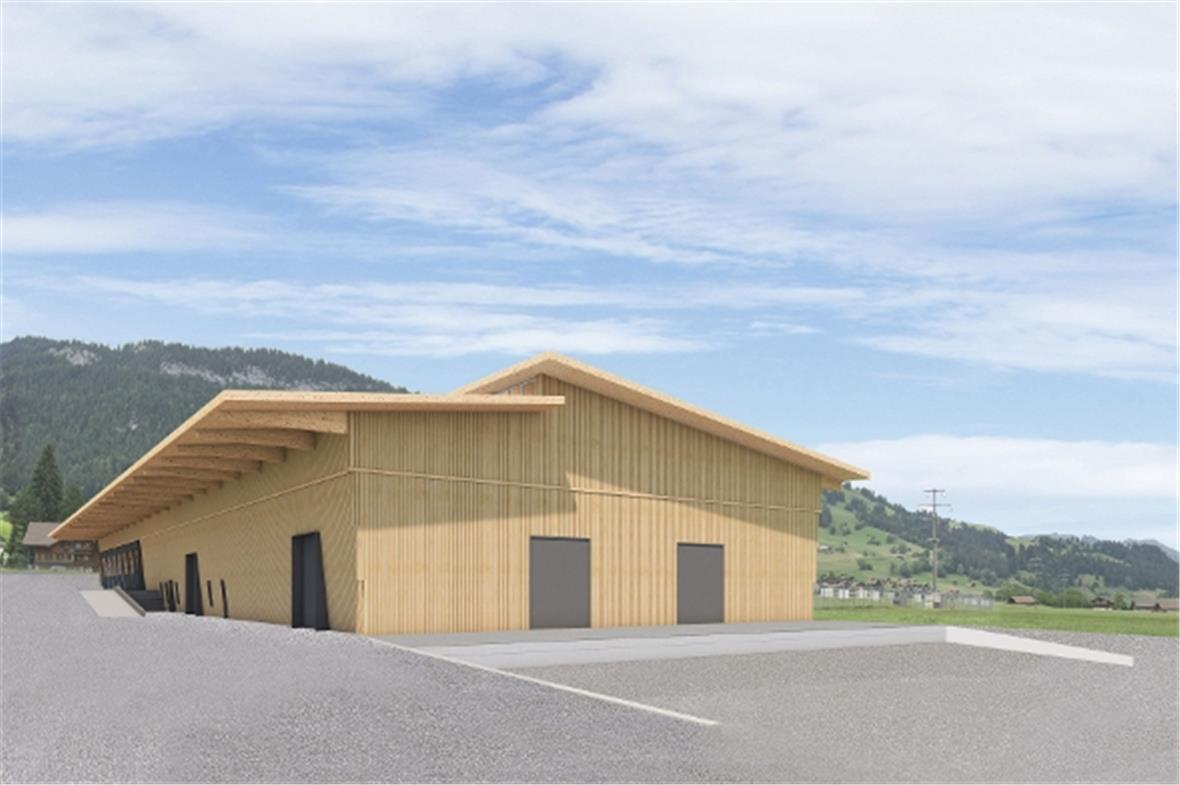 Eine Halle für zwei: Ladekante mit angrenzender Markt- und Veranstaltungshalle (Vordergrund), integriertes Feuerwehrmagazin im hinteren Teil der Halle.