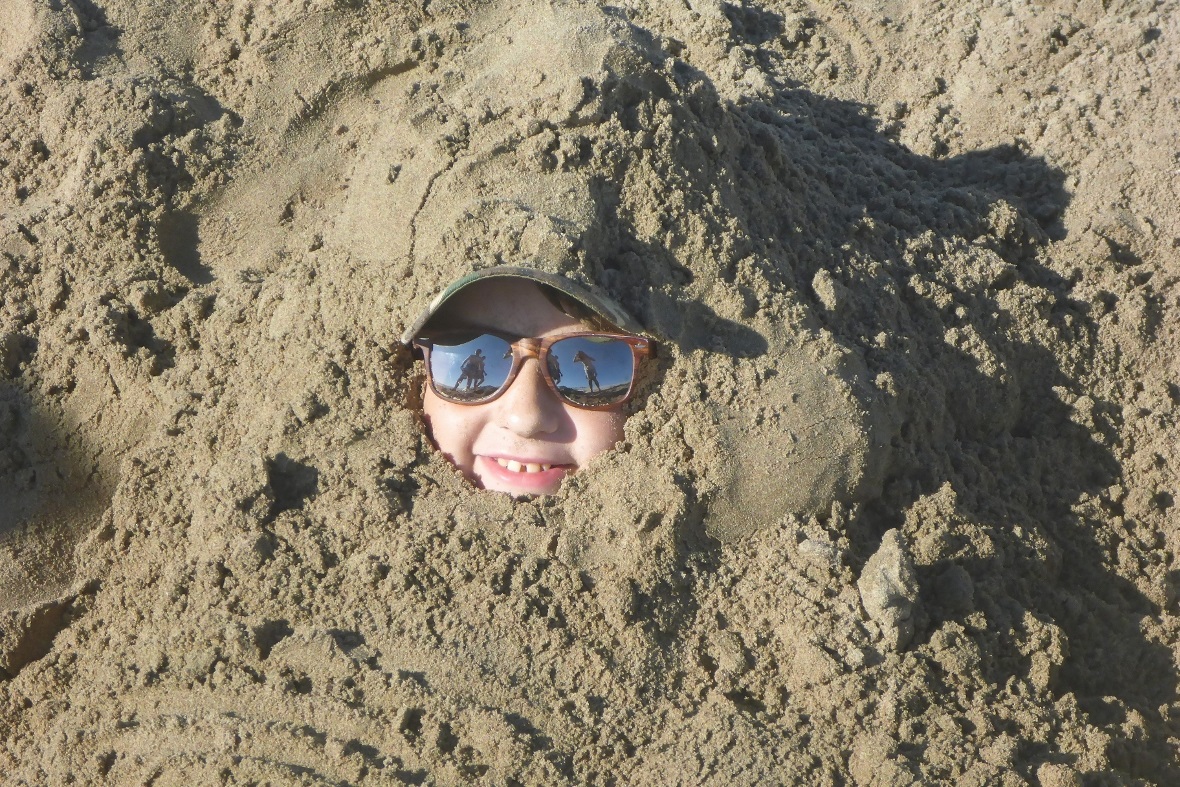 Eingebuddelt von Kopf bis Fuss