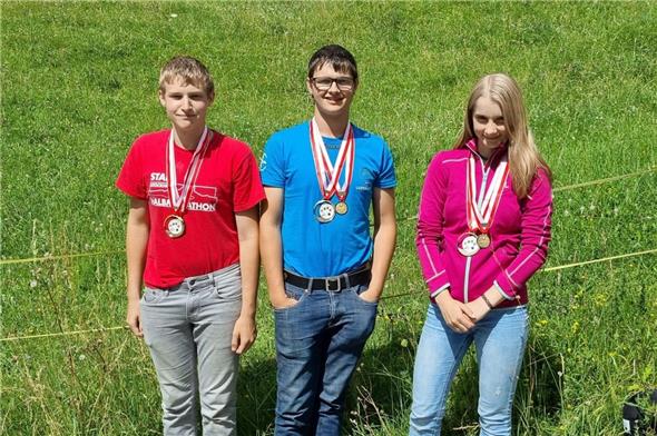 Patrick Heim (Mitte) gewann das Wettschiessen vor seinem Bruder Fabio und der drittplatzierten Céline Burri.