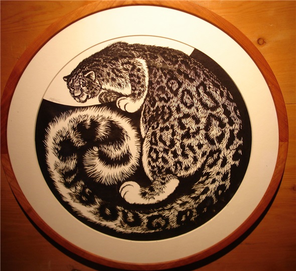 Schneeleopard (Scherenschnitt von Ernst Oppliger).